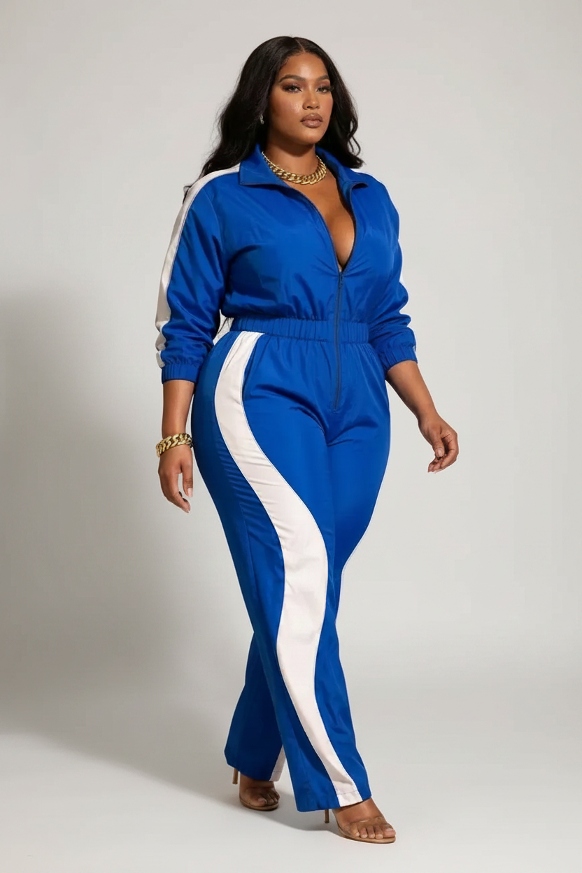 The Fast Lane Set — cobalt blue and white contrast two-piece with zip-up crop track jacket and high-waist track pants