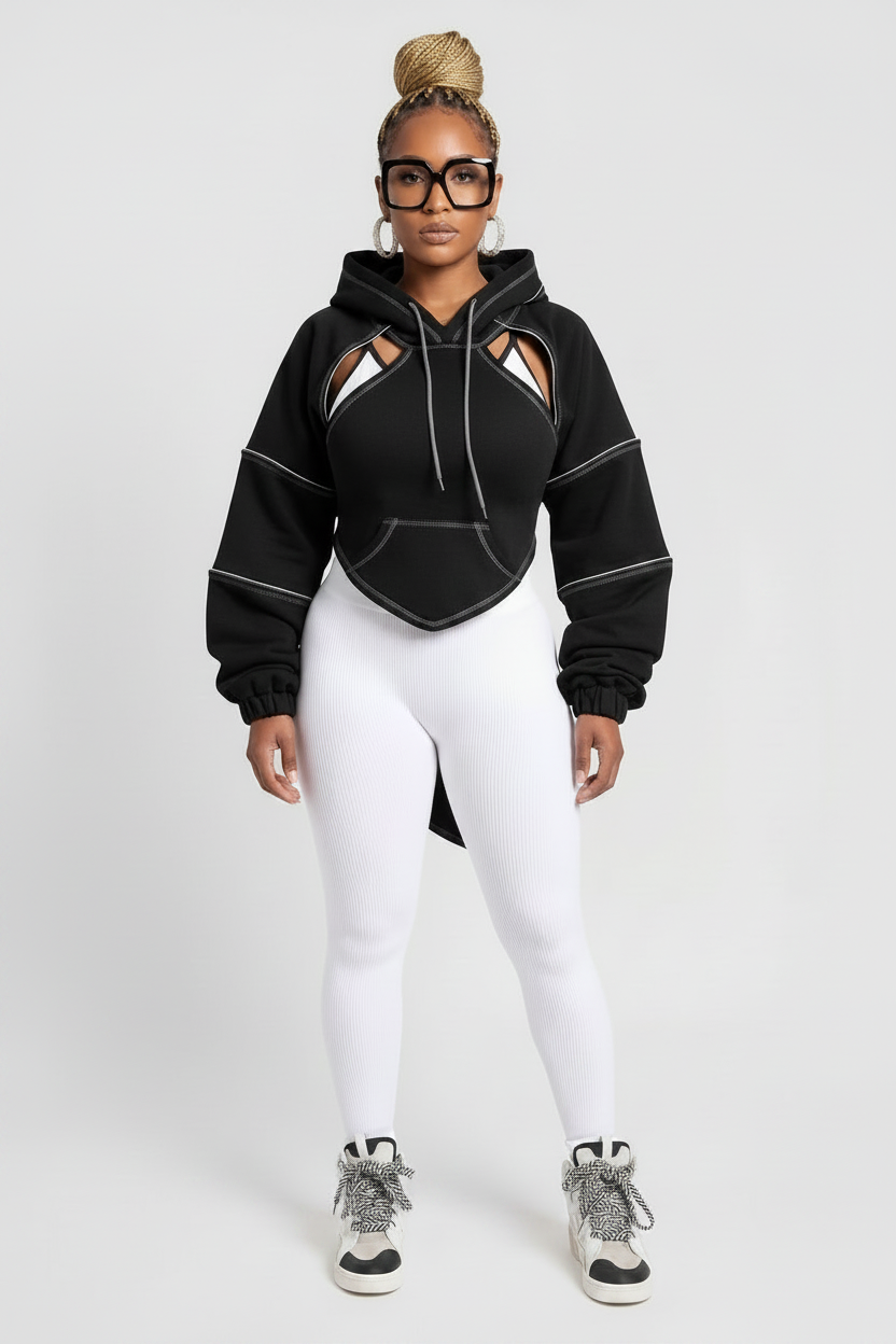 The Remix Hoodie — black deconstructed cropped hoodie with white contrast topstitching, cutout shoulders and open tie-back detail