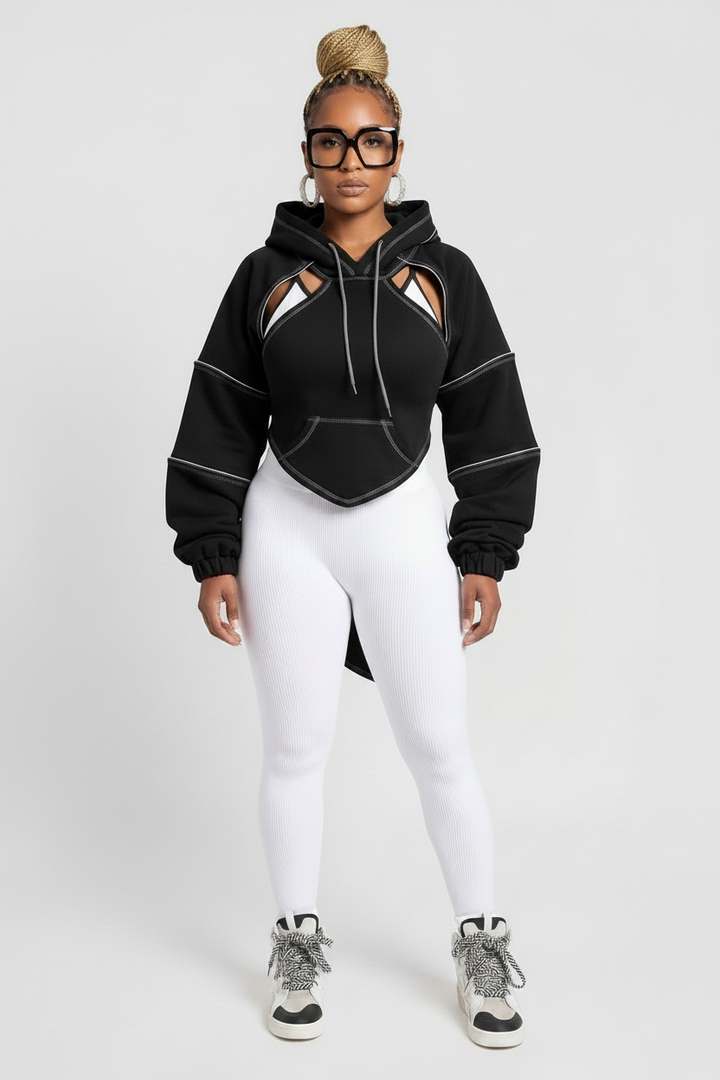 The Remix Hoodie — black deconstructed cropped hoodie with white contrast topstitching, cutout shoulders and open tie-back detail