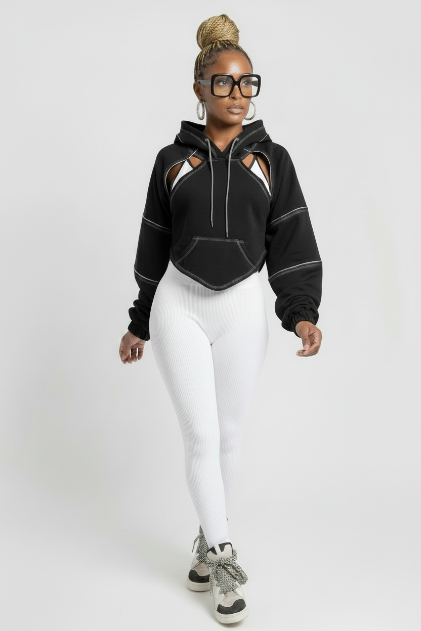 The Remix Hoodie — black deconstructed cropped hoodie with white contrast topstitching, cutout shoulders and open tie-back detail