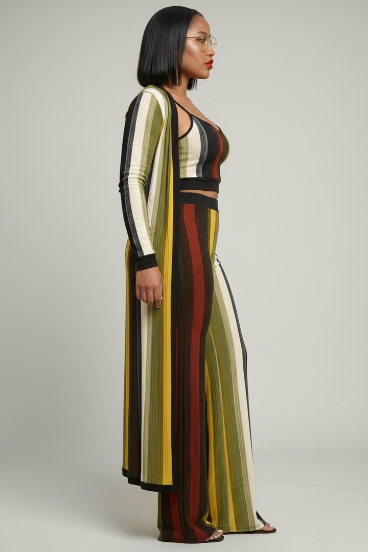 The Krishna Set — multi-color striped knit three-piece with long duster cardigan, spaghetti-strap crop top and high-waist palazzo pants