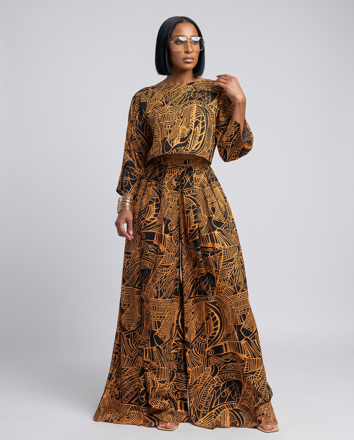 The Willow Set — black and gold abstract print two-piece with loose-fit cropped top and high-waist wide leg pants with pockets